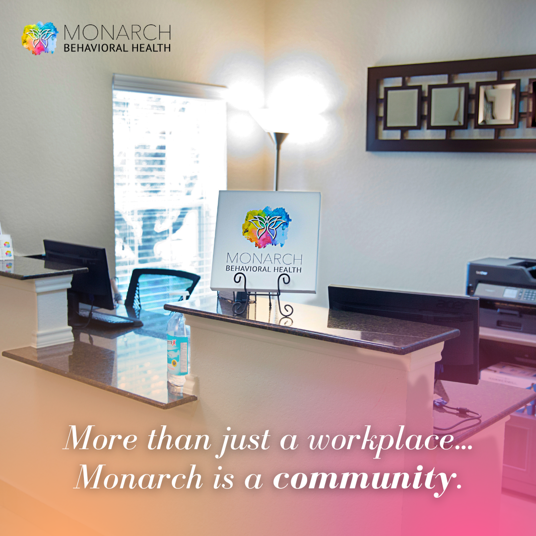Front desk area at Monarch Behavioral Health with welcoming lighting and signage, illustrating that Monarch is where you belong and emphasizing community, connection, and a supportive environment.