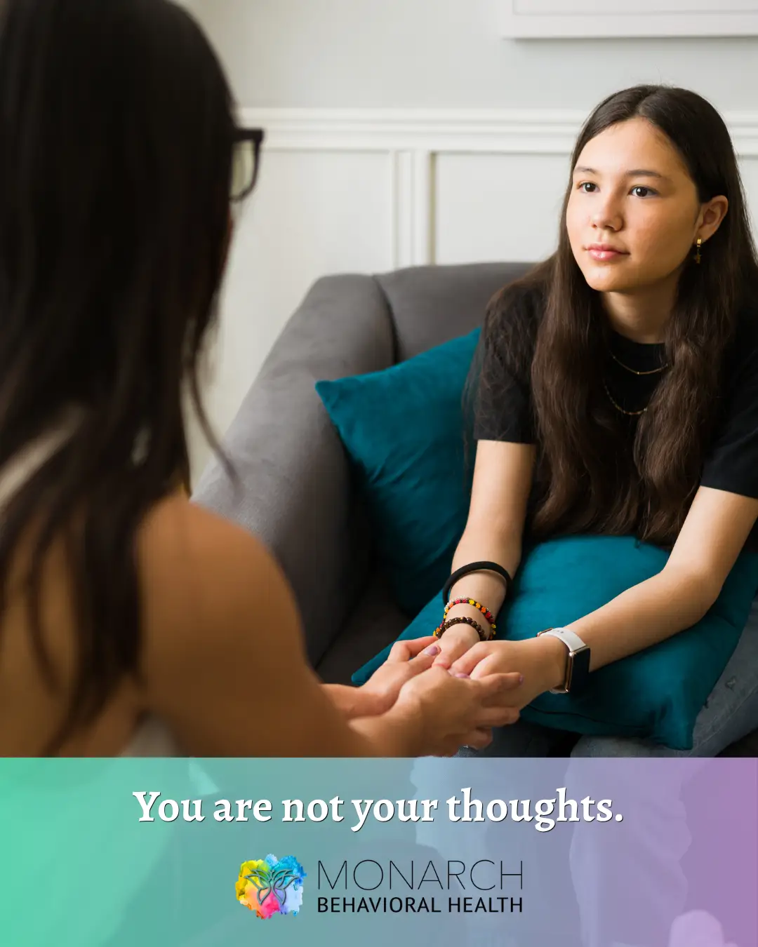 Young girl sitting with a therapist during a counseling session for psychological testing for children at Monarch Behavioral Health